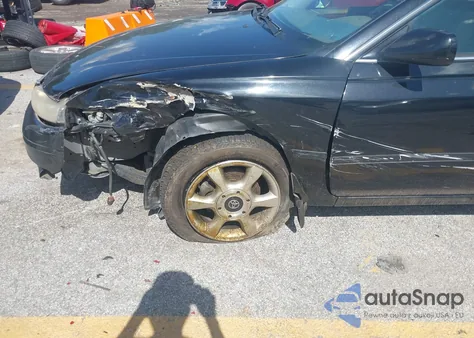 2000 Toyota Camry Solara Se V6/Sle V6 z USA, uszkodzony, nr VIN 2T1CF22P5YC323186